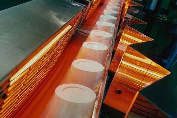 Infrared heat for processes in the packaging materials industry
